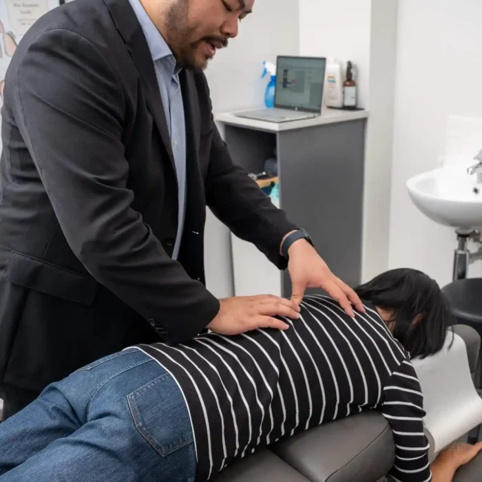 Dr-Ernie-adjusting-1-scaled